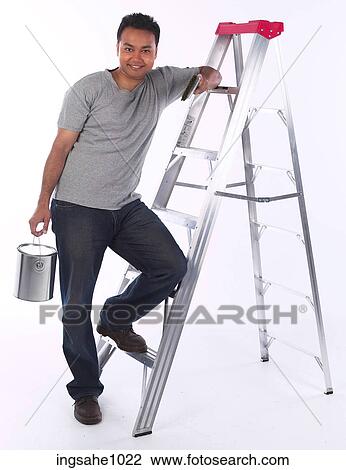 Stock Image - Man about to paint a81. Fotosearch