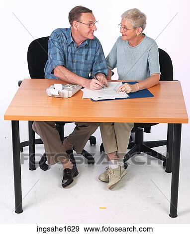 man and woman at desk BE 14 View Large Photo Image Stock Photo - man and woman at desk BE 14. Fotosearch