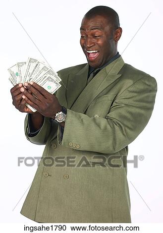Stock Image - man counting money BE 2. Fotosearch