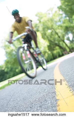 Man cycling 4 View Large Photo Image Stock Photo - Man cycling 4 . Fotosearch