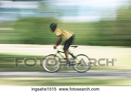 Stock Photography - Man cycling . Fotosearch