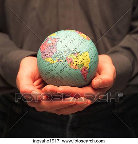 Man holding globe BE View Large Photo Image Stock Photo - Man holding globe BE. Fotosearch