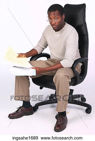 man reading in chair BE 3 View Large Photo Image Stock Photo - man reading in chair BE 3. Fotosearch