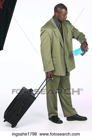 Stock Photo - man traveling BE. Fotosearch