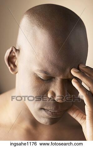 Stock Photograph - Man with a headache . Fotosearch