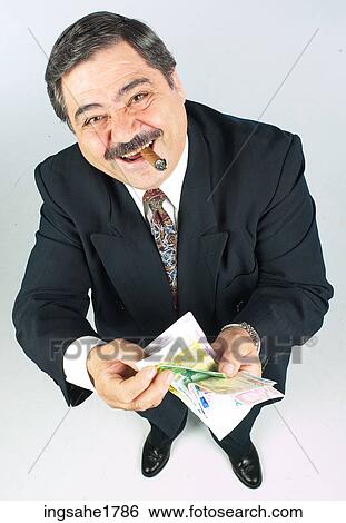 man with cigar and money BE 7 View Large Photo Image Stock Photograph - man with cigar and money BE 7. Fotosearch