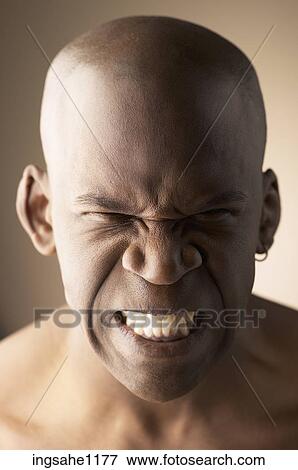Man with clenched teeth  View Large Photo Image Stock Photo - Man with clenched teeth . Fotosearch