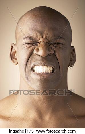 Man with clenched teeth View Large Photo Image Stock Photography - Man with clenched teeth. Fotosearch