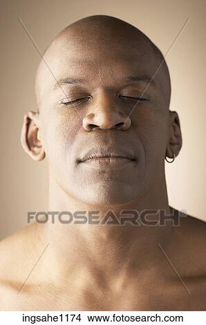 Picture - Man with closed eyes . Fotosearch