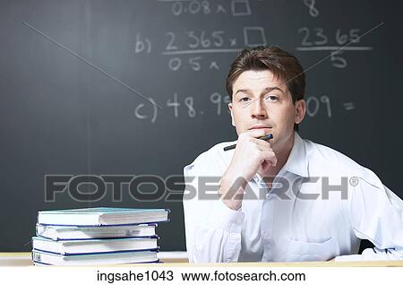 Math teacher looking out View Large Photo Image Stock Image - Math teacher looking out. Fotosearch
