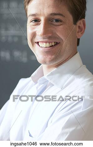 Stock Photograph - Math teacher smiling 1. Fotosearch