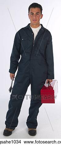 Mechanic carrying red toolbox a82 View Large Photo Image Picture - Mechanic carrying red toolbox a82. Fotosearch