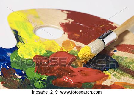 Paintbrush mixing paint colors View Large Photo Image Stock Photo - Paintbrush mixing paint colors. Fotosearch
