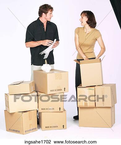 People Packing BE 1 View Large Photo Image Stock Image - People Packing BE 1. Fotosearch