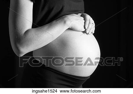 Picture - Pregnant belly . Fotosearch