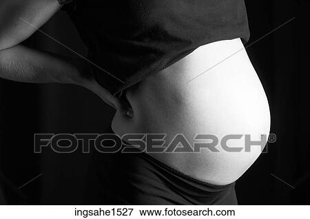 Pregnant belly View Large Photo Image Stock Photo - Pregnant belly . Fotosearch
