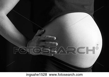 Pregnant belly View Large Photo Image Stock Photo - Pregnant belly . Fotosearch