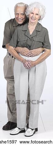 Stock Photo - senior couple standing together . Fotosearch