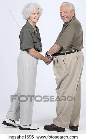 senior couple standing together View Large Photo Image Stock Photograph - senior couple standing together . Fotosearch