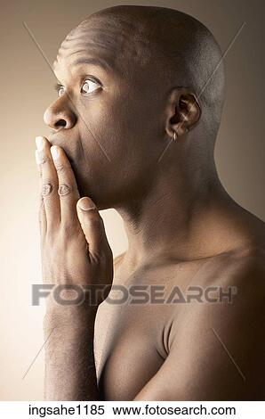 Stock Photography - Shocked man's face . Fotosearch