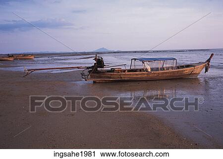 Single boat on the beach View Large Photo Image Stock Image - Single boat on the beach. Fotosearch