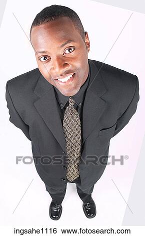 Stock Photograph - Smiling businessman a83. Fotosearch