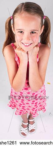 Stock Image - Smiling little girl . Fotosearch