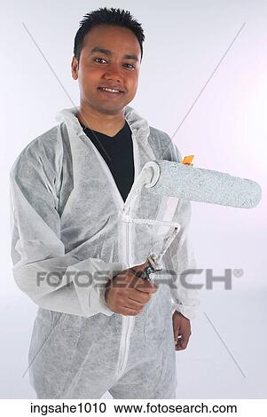 Smiling painter holding roller a82 View Large Photo Image Stock Image - Smiling painter holding roller a82. Fotosearch