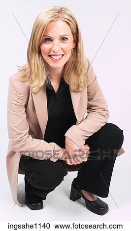 Squatting businesswoman a81 View Large Photo Image Stock Image - Squatting businesswoman a81. Fotosearch