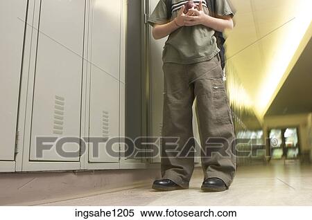 Stock Photography - Student's feet in school hallway 1. Fotosearch