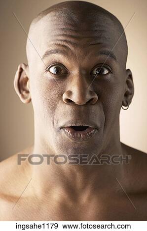 Surprised man's face View Large Photo Image Stock Photo - Surprised man's face . Fotosearch