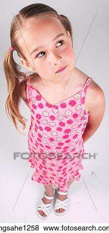 Thinking little girl View Large Photo Image Stock Photo - Thinking little girl . Fotosearch
