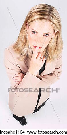 Thoughtful businesswoman a84 View Large Photo Image Picture - Thoughtful businesswoman a84. Fotosearch