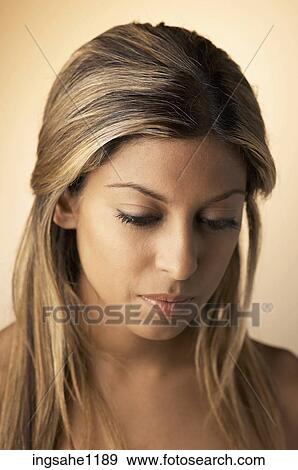 Thoughtful woman's face View Large Photo Image Stock Photo - Thoughtful woman's face . Fotosearch