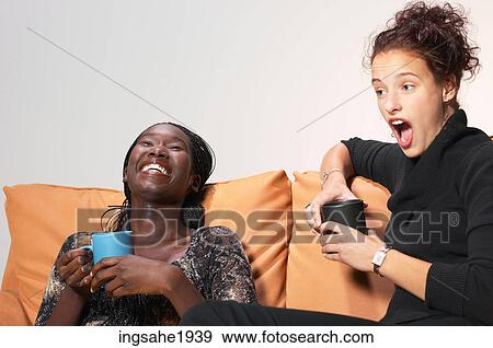 Two friends relaxing BE View Large Photo Image Stock Photo - Two friends relaxing BE. Fotosearch