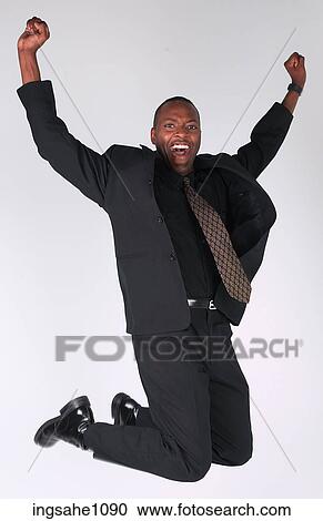Victorious businessman View Large Photo Image Stock Image - Victorious businessman. Fotosearch
