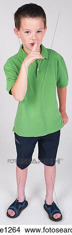 Picture - Whispering little boy . Fotosearch