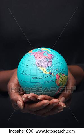 Woman holding globe BE 1 View Large Photo Image Stock Photograph - Woman holding globe BE 1. Fotosearch