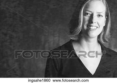 Stock Image - Woman in dark shirt BE 2. Fotosearch