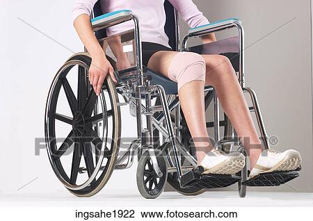 Woman in wheelchair BE View Large Photo Image Stock Image - Woman in wheelchair BE. Fotosearch