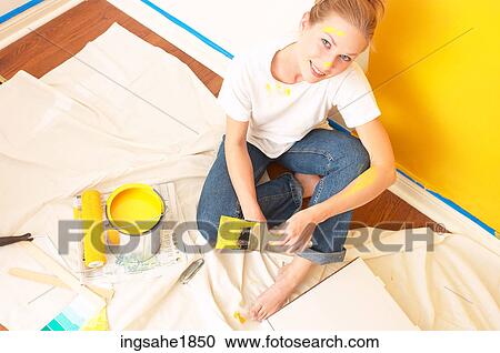Stock Image - Woman with painting paraphernalia BE 4. Fotosearch