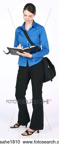 woman writing in planner BE 1 View Large Photo Image Stock Image - woman writing in planner BE 1. Fotosearch