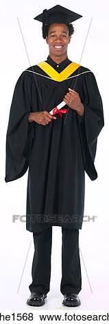 young man wearing graduation gown View Large Photo Image Stock Photo - young man wearing graduation gown . Fotosearch