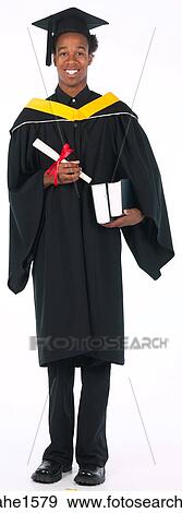 young man wearing graduation gown View Large Photo Image Stock Photo - young man wearing graduation gown . Fotosearch