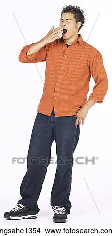 young man with orange shirt View Large Photo Image Picture - young man with orange shirt . Fotosearch