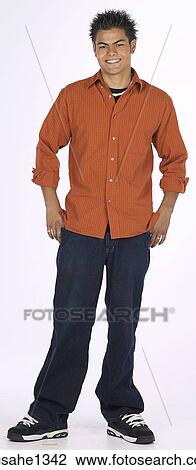 young man with orange shirt View Large Photo Image Stock Image - young man with orange shirt . Fotosearch