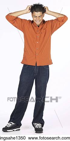 young man with orange shirt View Large Photo Image Stock Image - young man with orange shirt . Fotosearch