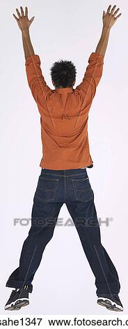 young man with orange shirt View Large Photo Image Stock Photo - young man with orange shirt . Fotosearch