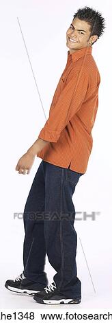 Stock Photo - young man with orange shirt . Fotosearch