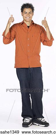 Stock Photo - young man with orange shirt . Fotosearch